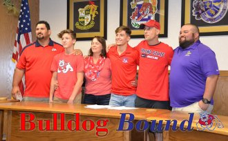 Tiger wrestler signs letter-of-intent to compete for the Fresno State Bulldogs Joining Gary Joint (left to right) Coach Marcio Botelho, brother Wayne, Mom Melissa, Gary, Dad Kevin, and Coach Armando Calderon.